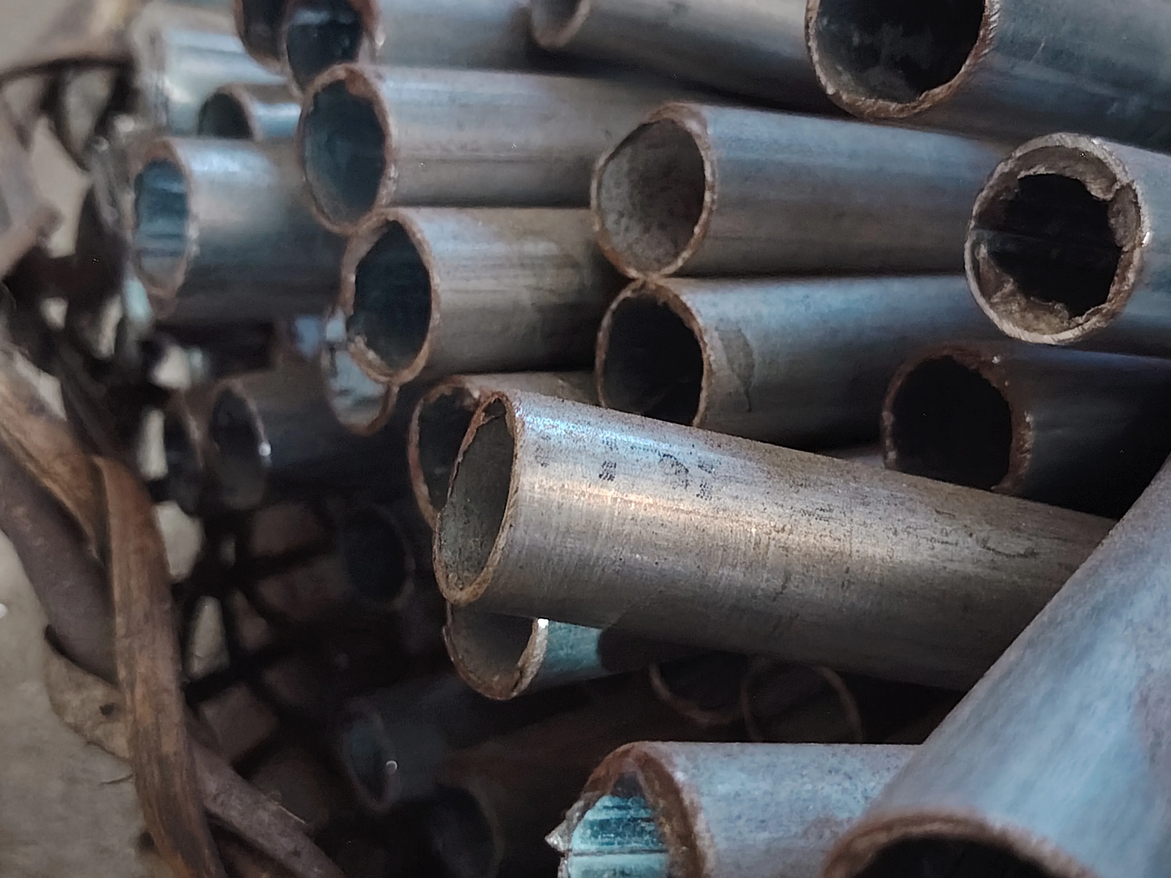 An image of bunch of metal pipes as a background image.